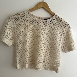Crochet cream crop top. Size XXS, I’m usually a XS/S and this fits perfect